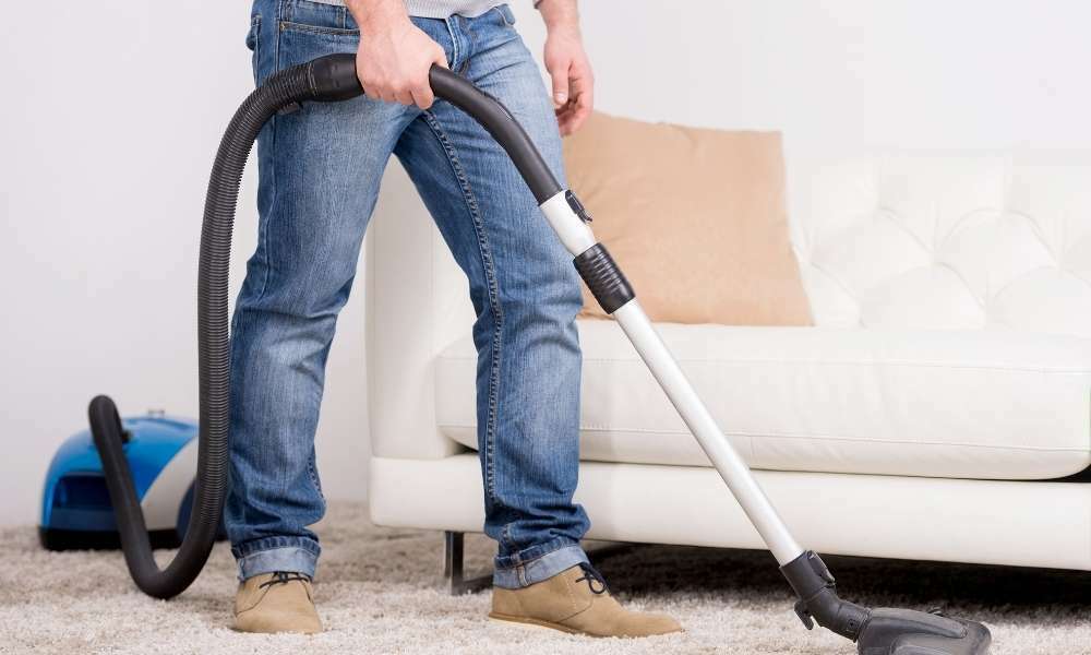 Vacuum or Sweep To Clean Under Appliances