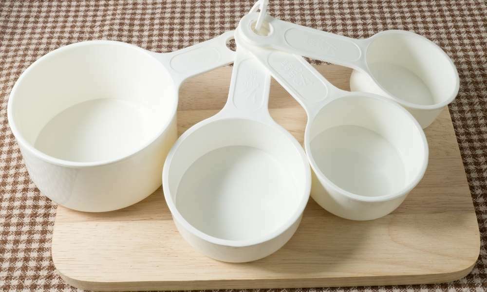 Measure Cups And Spoons To Organize Bakeware