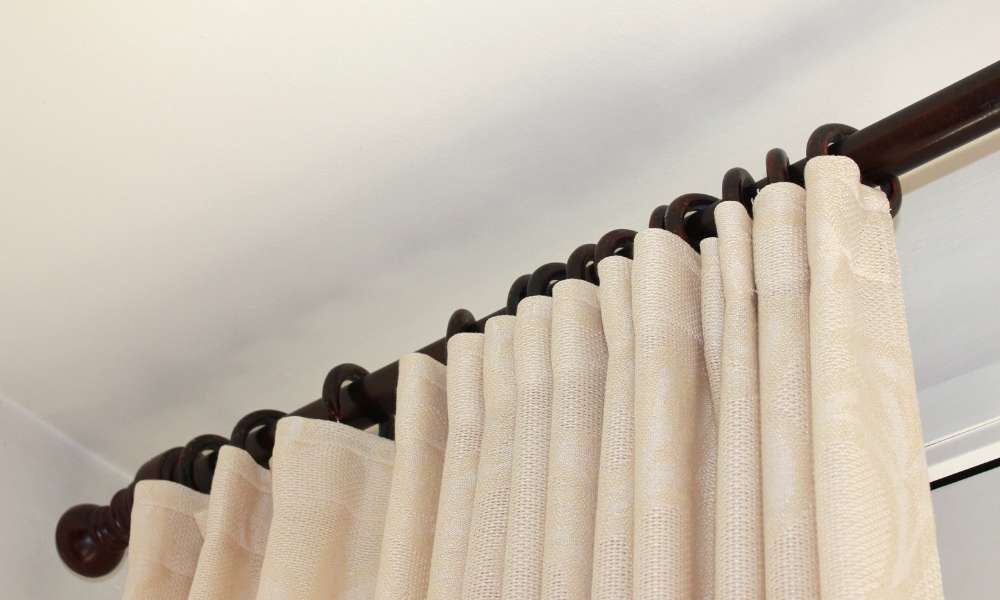 Use A Classic Curtain Rod To Keep Outdoor Curtains From Blowing