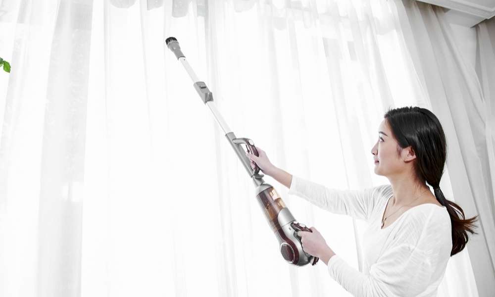 Use A Vacuum Cleaner to wash blackout curtains