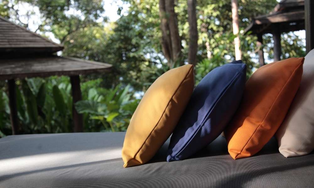 Add Ties To Pillows To Keep Outdoor Pillows From Blowing Away