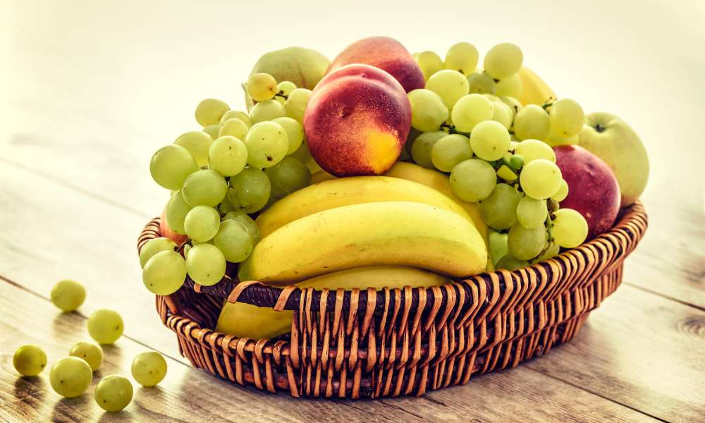 Place a Fruit Bowl to Decorate a Round Dining Table