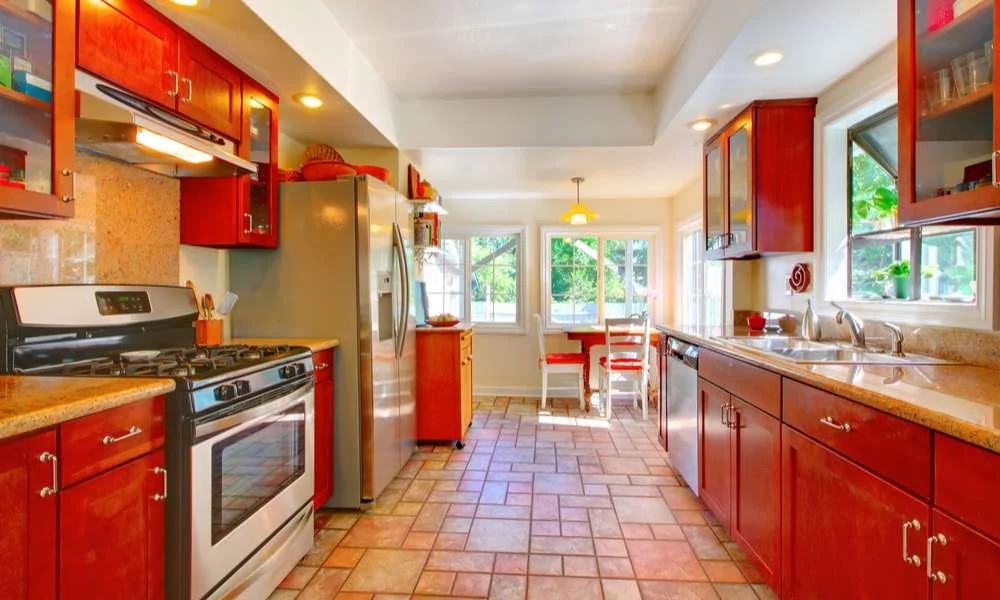 Let in More Natural Light to Lighten Up a Kitchen With Cherry Cabinets