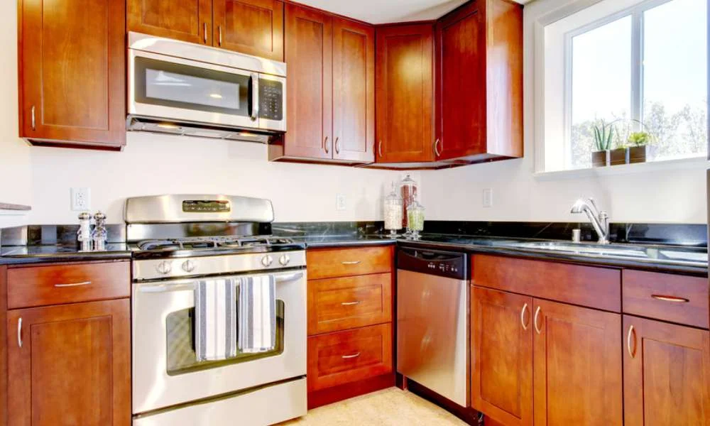 Use White in Your Kitchen to Lighten Up a Kitchen With Cherry Cabinets