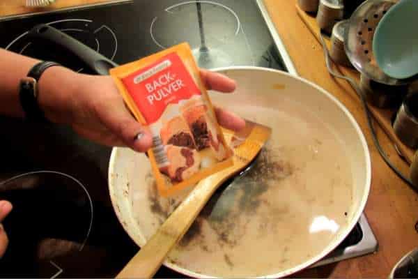 Remove Loose Debris and Wipe the Outside of the Cookware with a Damp Cloth
